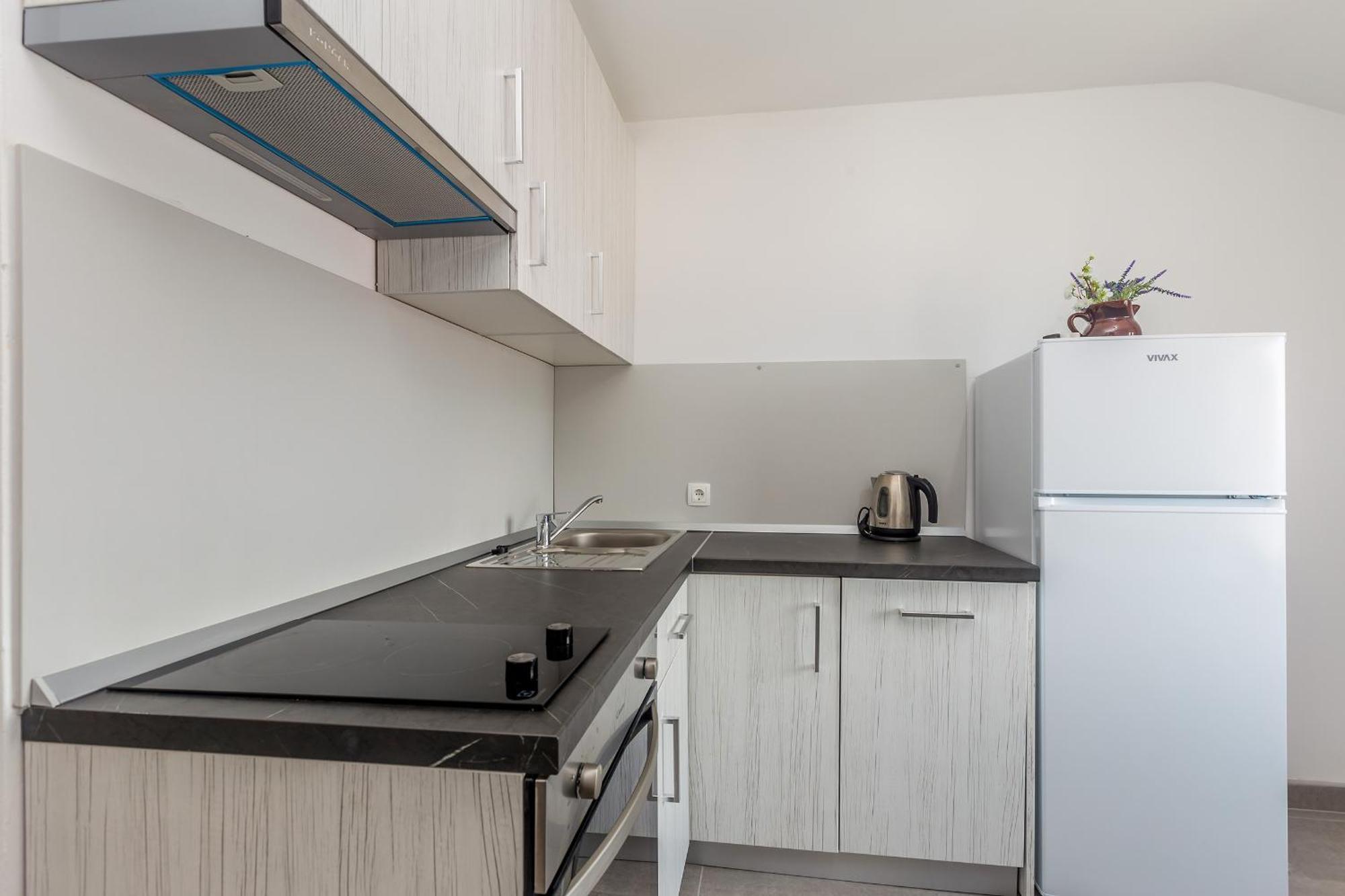 Apartmani Tena Njivice Buitenkant foto